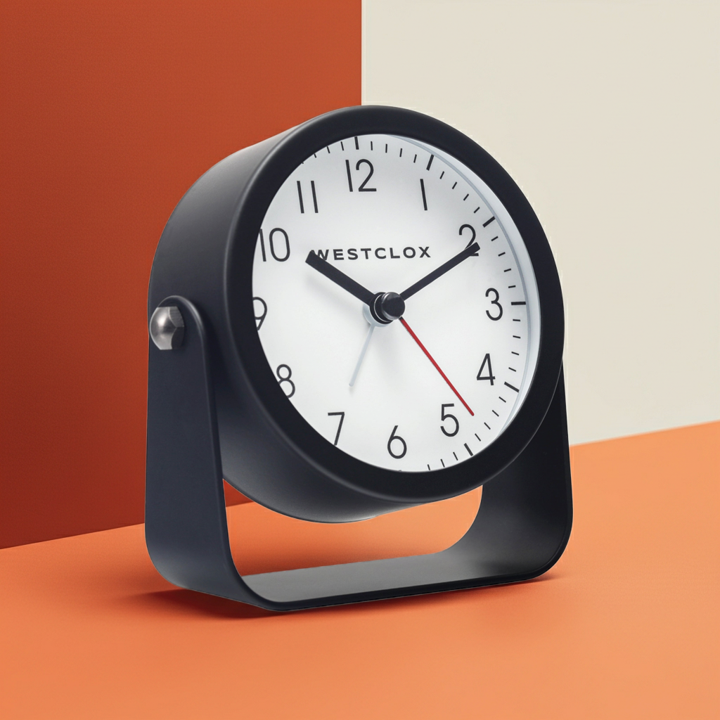 Westclox Compact Analog Alarm Clock, 4.1 Inch Black Bedside Clock with Snooze and Adjustable Tilt